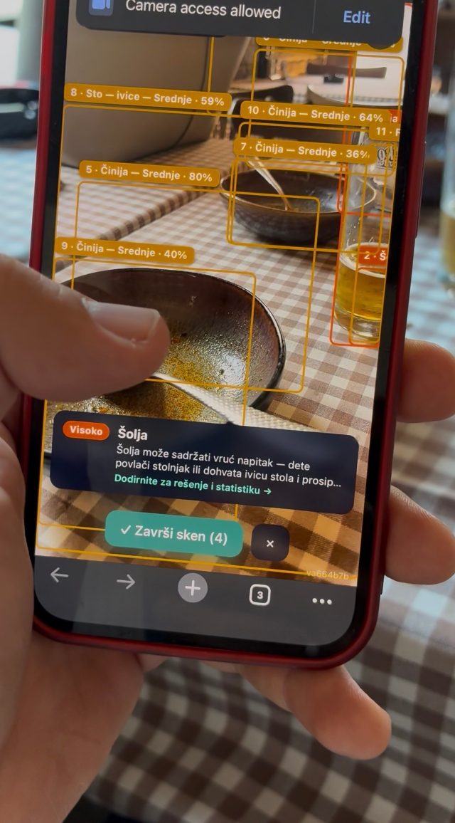 SafeNest AI live scanning a restaurant table — bowls and a hot cup marked as hazards with severity labels and AI confidence